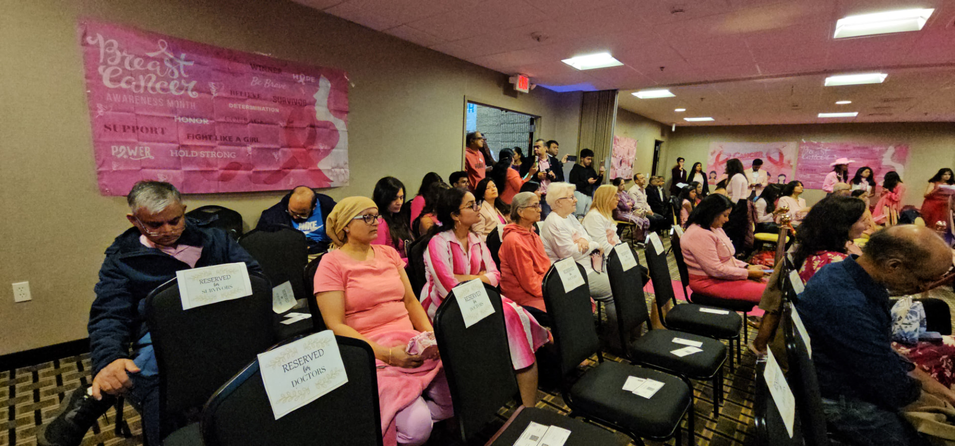 Audience with reserved seats for survivors and doctors